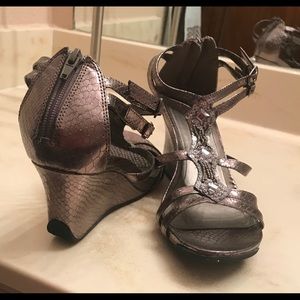 Kenneth Cole pewter colored shoes.